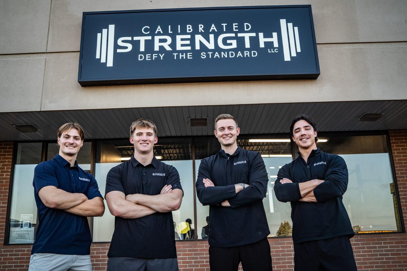 The Calibrated Strength coaching team outside the gym